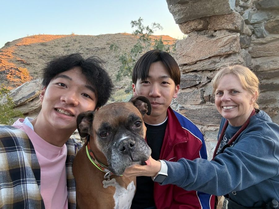 Host family with students outdoors